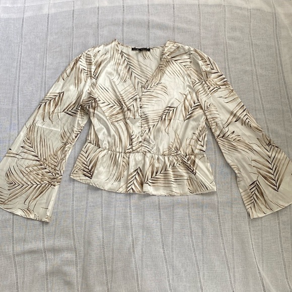 White House Black Market silky peplum blouse. - Picture 9 of 14